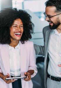 Sunny Sabbini - Partners Smiling and Celebrating Success