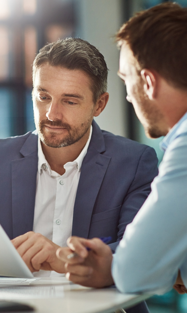 Business partner looking reviewing a document