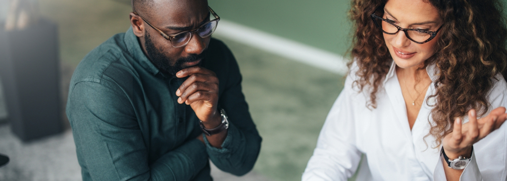 Cofounders with glasses working